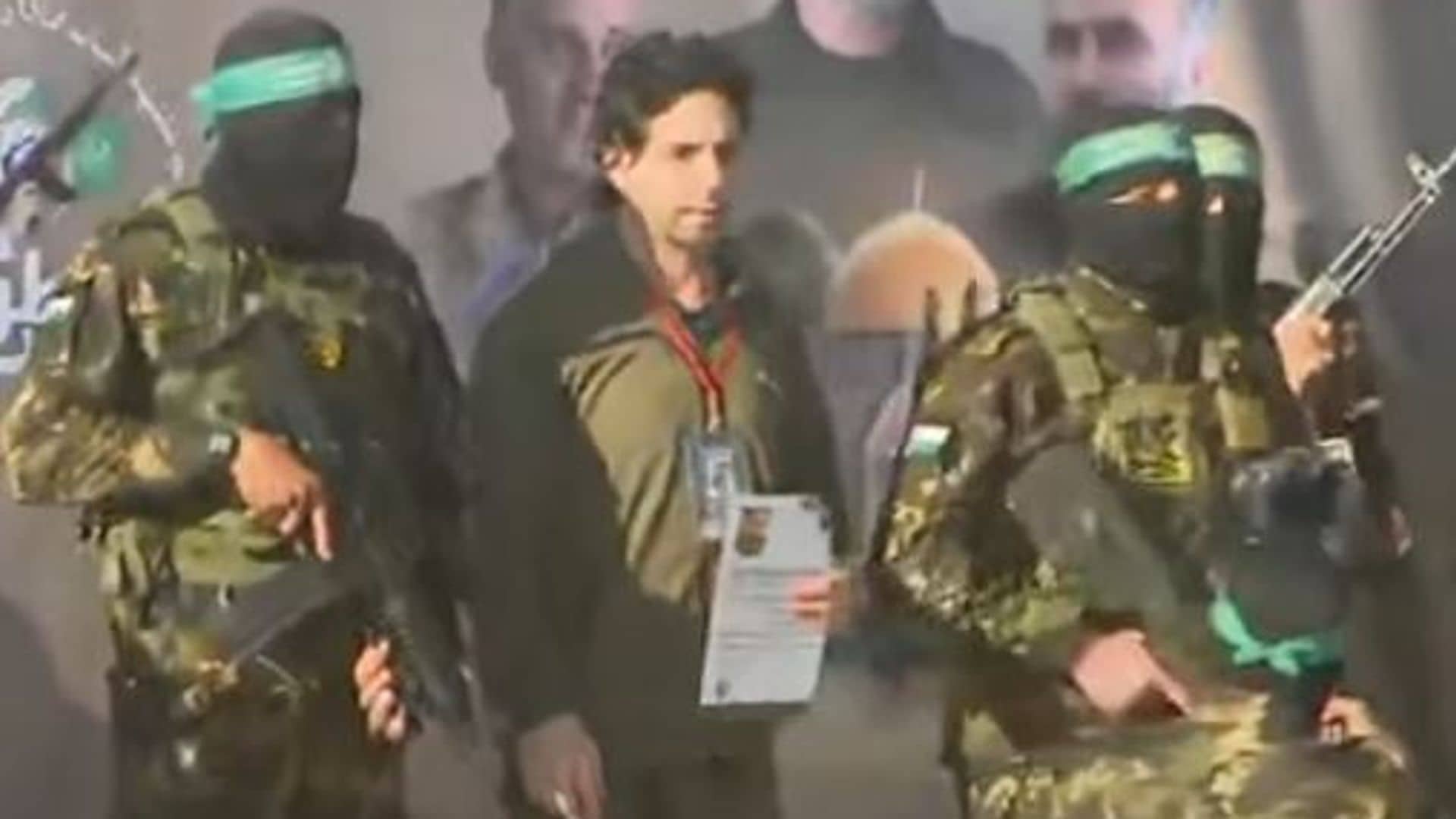Two Israeli hostages handed to the Red Cross in Gaza – but third not yet seen