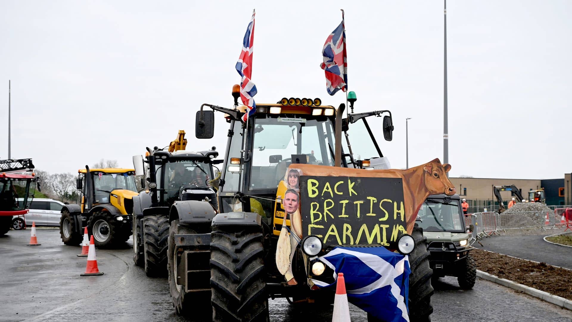 Starmer cuts short visit after farmers stage noisy tractor protest