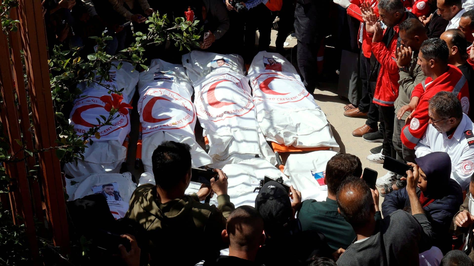 Gaza aid workers ‘targeted’ by Israel, Palestinian agency says, as bodies recovered from ‘mass grave’