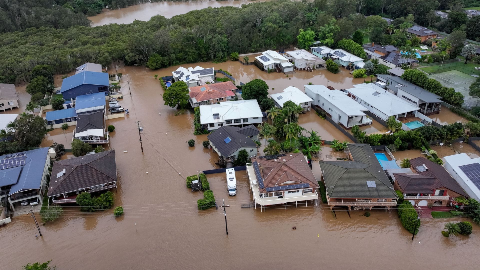 Natural disaster declared in New South Wales – as four months of rain falls in just two days
